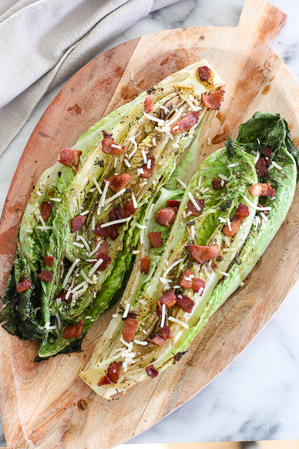 Grilled Romaine with Fig Vinaigrette on a wooden serving board