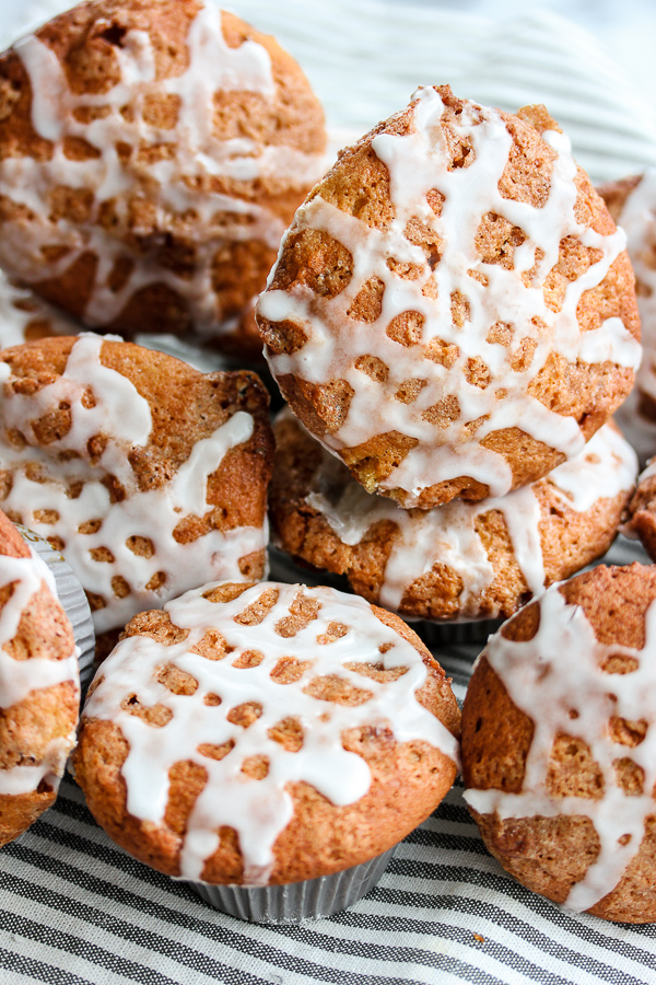 close up of glazed cinnamon roll muffins