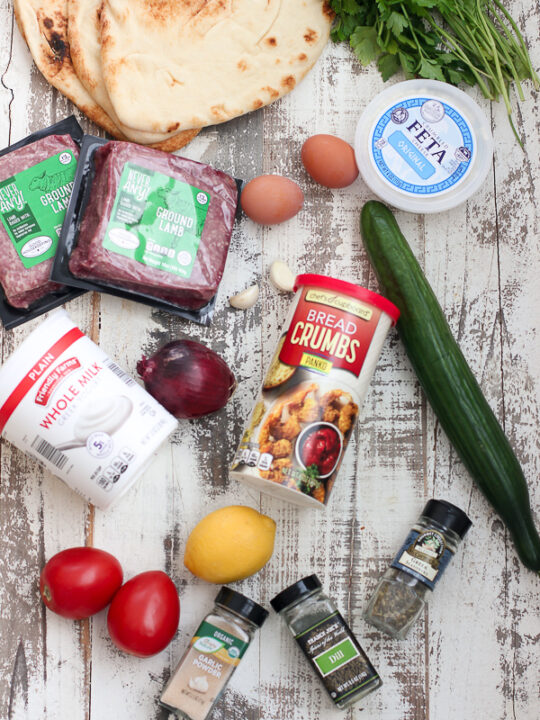 Lamb meatballs with tzatziki sauce ingredients displayed