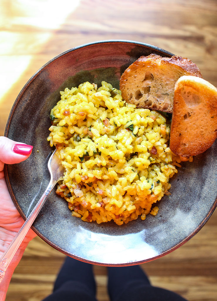 Overhead photo of bowl with risotto and bread