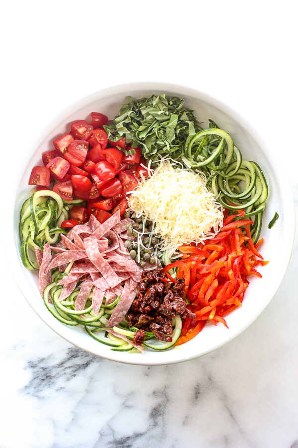 Prepped ingredients in a large bowl before mixing together to highlight what the prepped ingredients look like.